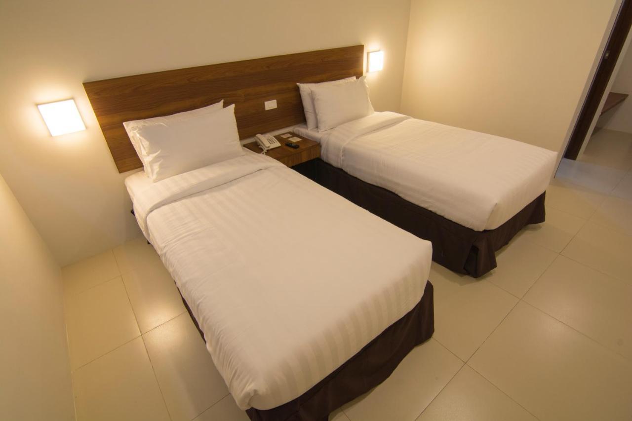 Mango Suites Cauayan Экстерьер фото