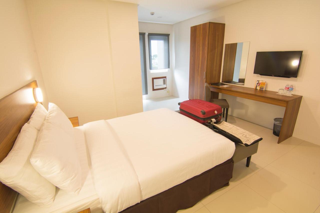 Mango Suites Cauayan Экстерьер фото